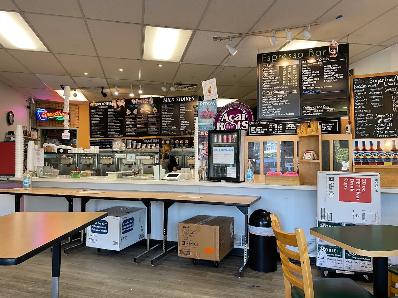 The espresso bar and menu boards inside Rockie's Frozen Yogurt